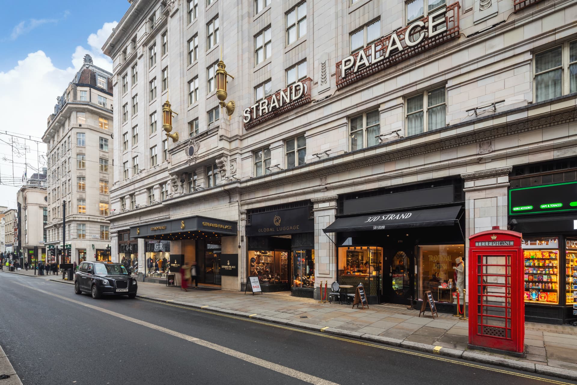 370 Strand on the Strand, next to the Strand Palace Hotel and a red telephone box